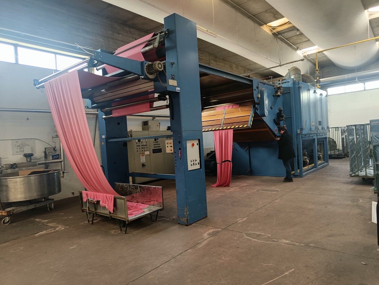 SANTEX continuous dryer with air vibration belt for open knitting and woven fabrics