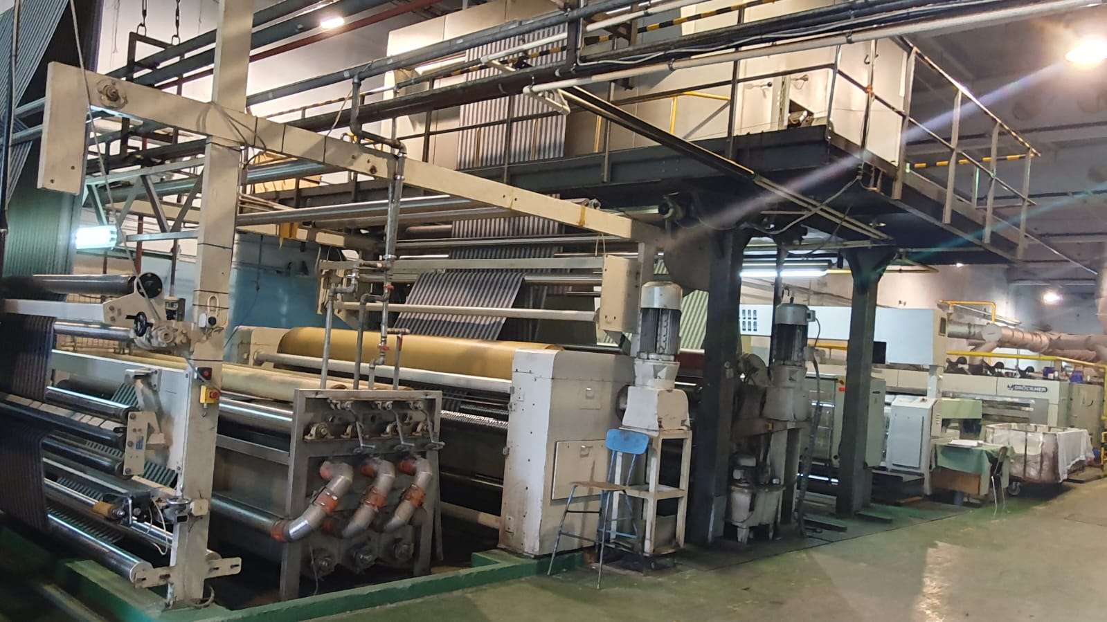 BRUECKNER stenter machine, 6 chambers gas heated with Kusters washing vat and coating padder